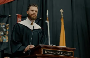 Kansas City Chiefs’ placekicker Harrison Butker speaks to college graduates in his commencement address at Benedictine College on Saturday, May 11, 2024. Credit: Benedictine College