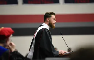 Kansas City Chiefs’ placekicker Harrison Butker speaks to college graduates in his commencement address at Benedictine College on Saturday, May 11, 2024. Credit: Benedictine College