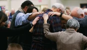 Participants are led through a prayer for those wanting to receive healing during a healing service led by Father Mathias Thelen of Encounter Ministries at St. Patrick Catholic Church in Brighton, Michigan, on Dec. 6, 2024.