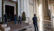 Pilgrims cross the Holy Door of St. Peter’s Basilica in the Vatican on Dec. 25, 2024.