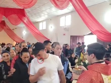 The moment a man tries to steal a consecrated host in Honduras.