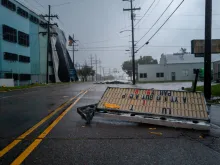 Signage is strewn across the intersection after Hurricane Francine swept through the area on Sept. 11, 2024, in Houma, Louisiana.