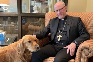 Bishop James Conley and his dog Stella
