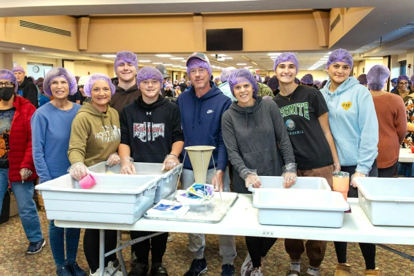 The annual packaging effort has taken place for several years, with meals benefiting victims of disasters and families wherever they are needed. In total, the project has sent nearly 500,000 meals, with the parish eyeing a goal of 1 million meals in the years to come. Credit: Steven Stechschulte/Special to Detroit Catholic