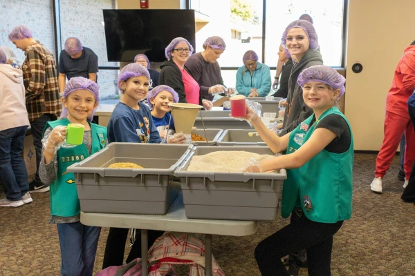 Many young people participated in the annual packaging effort which has taken place for several years, with meals benefiting victims of disasters and families wherever they are needed. Credit: Steven Stechschulte/Special to Detroit Catholic