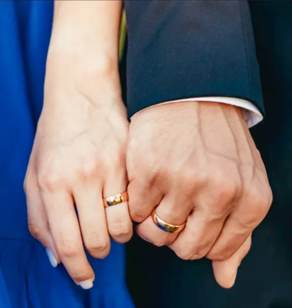 A close-up of the hands of Sabeen Rahil and Elias Al Arja after exchanging rings during the engagement ceremony in Bethlehem on Aug. 3, 2024. Credit: Photo courtesy of Sabeen Rahil and Elias Al Arja