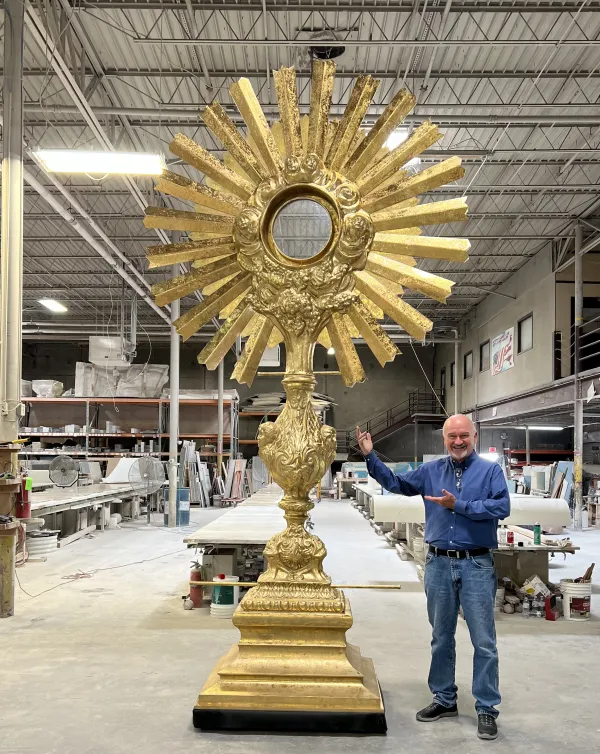 The procession will include a "world-record" monstrance constructed by Lyndon Stromberg, owner and operator of Stromberg Architectural Products of Greenville, Texas (pictured above). The monstrance stands 14 feet tall and will hold a 14-inch host, easily visible from the riverbanks and by the crowds in attendance. Credit: Photo courtesy of the CJC