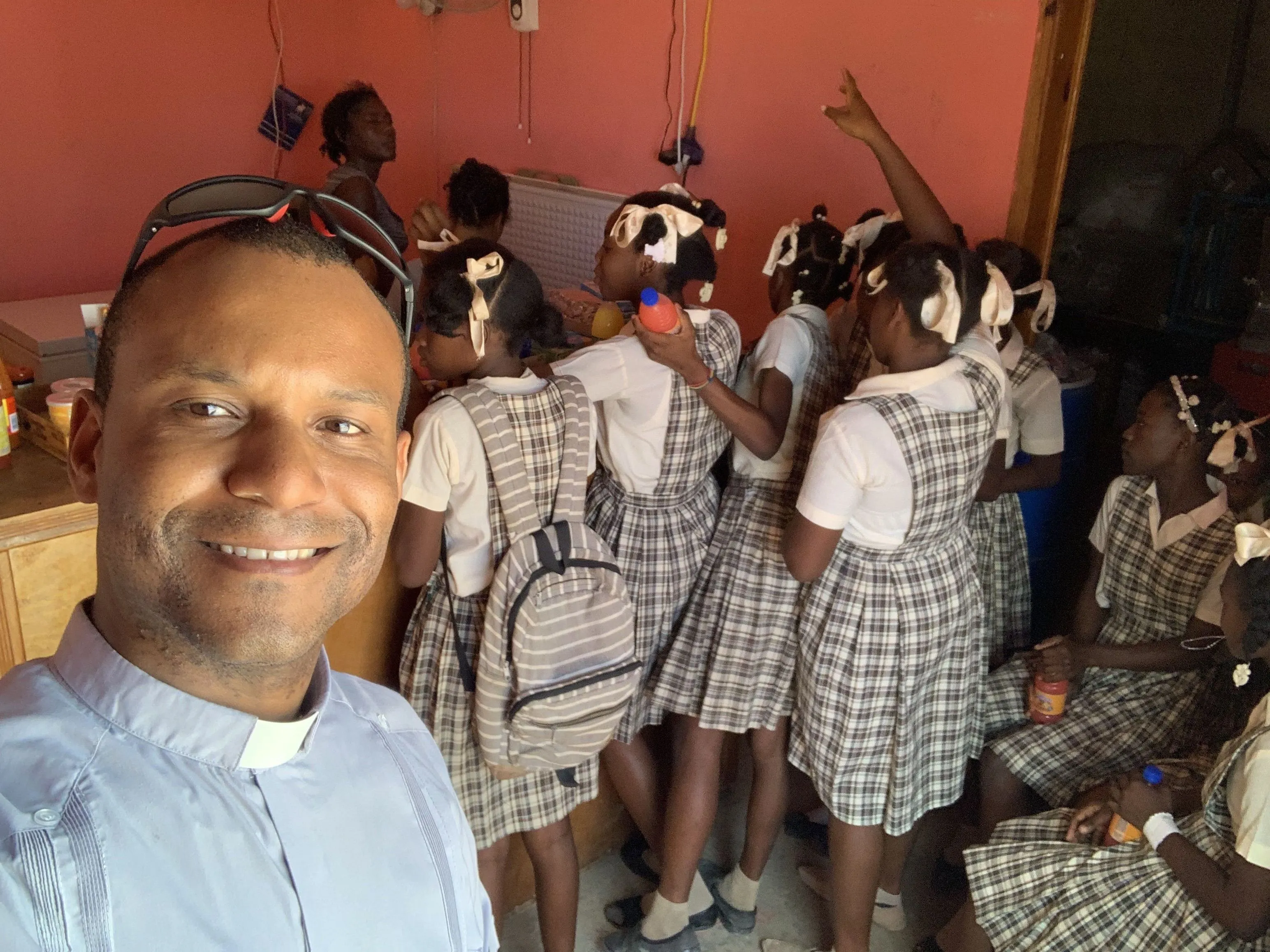 Missionary priest builds up Haiti one student, one classroom at a time