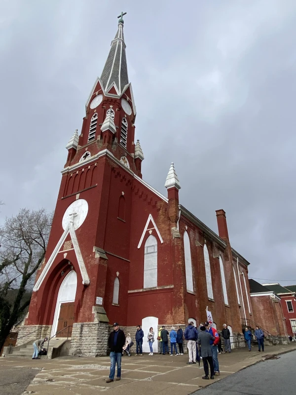 The currently unused Our Lady of Perpetual Help Catholic Church and its rectory the Serenelli Project seeks to acquire. Credit: The Serenelli Project