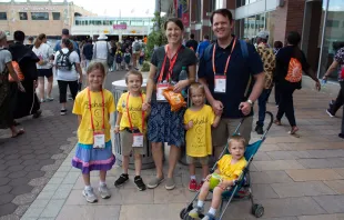 Steven and Joelle Schlotter, from Louisville, Kentucky, created special homemade T-shirts for their children in honor of the National Eucharistic Congress. Credit: Jonah McKeown/CNA