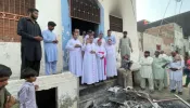 The archbishop of Islamabad-Rawalpindi, Joseph Arshad, addresses the persecuted Christian community of Jaranwala in August 2023. Twenty-one Catholic churches, Bibles, and family homes were set on fire.