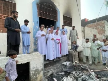 The archbishop of Islamabad-Rawalpindi, Joseph Arshad, addresses the persecuted Christian community of Jaranwala in August 2023. Twenty-one Catholic churches, Bibles, and family homes were set on fire.