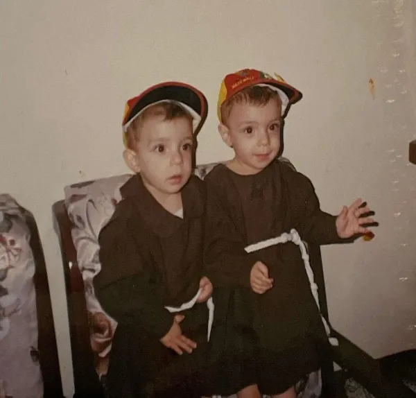 Twins George and Johnny Jallouf, as toddlers, wearing the Franciscan habit. They were born in January 1996 and were not given much hope initially. “Our mother made several vows for our health, including one to St. Anthony. That's why as children, she dressed us in Franciscan robes.” The twins were ordained priests on July 6, 2024, in Aleppo, Syria, their hometown. Credit: Photo courtesy of George and Johnny Jallouf