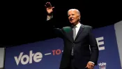President Joe Biden waves on stage during the Vote To Live Properity Summit at the College of Southern Nevada in Las Vegas, Nevada, on July 16, 2024.