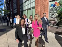 Members of the Kappa Kappa Gamma sorority, biological women’s sports activist Riley Gaines, and lawyers from the Independent Women’s Law Center approach the 10th Circuit Courthouse in Denver on May 14, 2024.