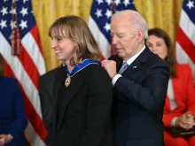 President Joe Biden presents the Presidential Medal of Freedom to U.S. swimmer Katie Ledecky in the East Room of the White House in Washington, D.C., on May 3, 2024.
