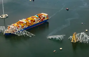 In an aerial view, the cargo ship Dali sits in the water after running into and collapsing the Francis Scott Key Bridge on March 26, 2024, in Baltimore. Credit: Tasos Katopodis/Getty Images