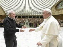 Pope Francis greets Kiko Argüello during a meeting with the Neocatechumenal Way in the Vatican's Paul VI Hall, June 27, 2022.