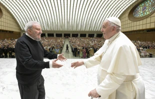 Pope Francis greets Kiko Argüello during a meeting with the Neocatechumenal Way in the Vatican's Paul VI Hall, June 27, 2022. Vatican Media