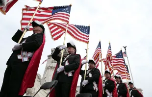 A Virginia council of the Knights of Columbus will be permitted to hold its annual Memorial Day Mass on Monday, May 27, 2024, in a federal cemetery after the National Park Service (NPS) backed down and allowed the group to hold the observance. Credit: Win McNamee/Getty Images