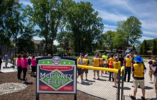 Knights from several councils in Michigan join athletes from the Challenger Division of Clinton Valley Little League, which serves people with disabilities, for the June 15, 2024, dedication of McGivney Field, a new accessible baseball diamond at Neil Reid Park in Clinton Township. Credit: Jonathan Francis