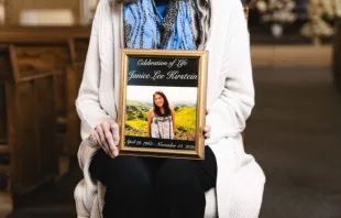 Kathleen Anderson holds a photo of the woman whose heart was donated and transplanted into her. Anderson still keeps in contact with the woman’s family. Credit: Isabel Cacho/Angelus News