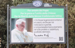 A group of Traditional Latin Mass supporters in Italy posted signs as part of a billboard campaign in a neighborhood near the Vatican on March 28, 2023. Credit: Daniel Ibañez/CNA