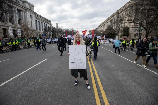 Pro-life activist Anna Lulis holds the sign 