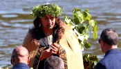 The new Maori Queen Kuini Nga wai hono i te po — who is Catholic — leaves the waka (canoe) following her father, Maori king Tuheitia Pootatau Te Wherowhero VII, on Sept. 5, 2024, in Hamilton, New Zealand.