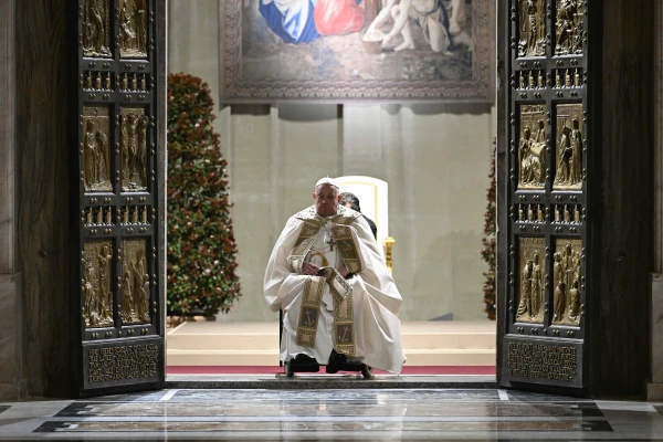 Pope Francis opens the Holy Door of St. Peter’s Basilica before Mass on Christmas Eve, Dec. 24, 2024, officially launching the Jubilee Year 2025. Credit: Vatican Media