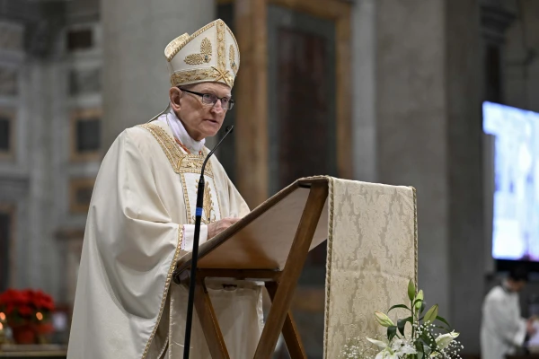 Cardinal James Harvey, a Milwaukee native and archpriest of the Basilica of St. Paul Outside the Walls, presides over the Mass for the opening of the Holy Door. Credit: Vatican Media