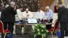 Pope Francis prays with members of the Synod on Synodality during one of its meetings in the Vatican's Paul VI Hall on the morning of Oct. 12, 2024.