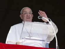 Pope Francis addresses the faithful during the Angelus address in St. Peter’s Square at the Vatican, Sunday, Oct. 13, 2024.