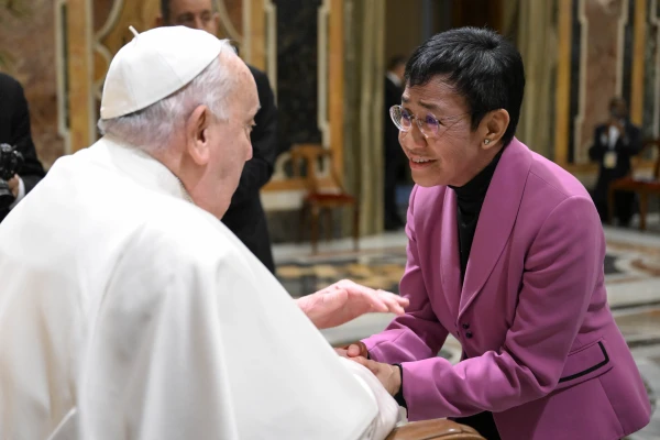 Pope Francis greets a visitor at a meeting with Church communications officials at the Vatican, Monday, Jan. 27, 2025. Credit: Vatican Media