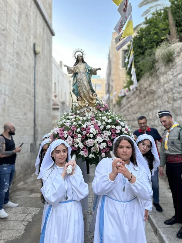 Palestinian Christians participate in a Marian procession on May 31, 2024, near the Church of the Holy Sepulcher in the Old City of Jerusalem to ask Our Lady of Palestine to intercede for peace in war-torn Gaza. Credit: Rafi Ghattas