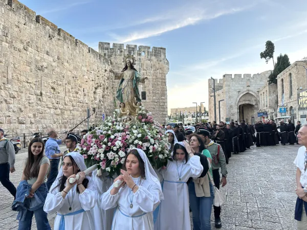 Palestinian Christians participate in a Marian procession on May 31, 2024, near the Church of the Holy Sepulcher in the Old City of Jerusalem to ask Our Lady of Palestine to intercede for peace in war-torn Gaza. Credit: Rafi Ghattas