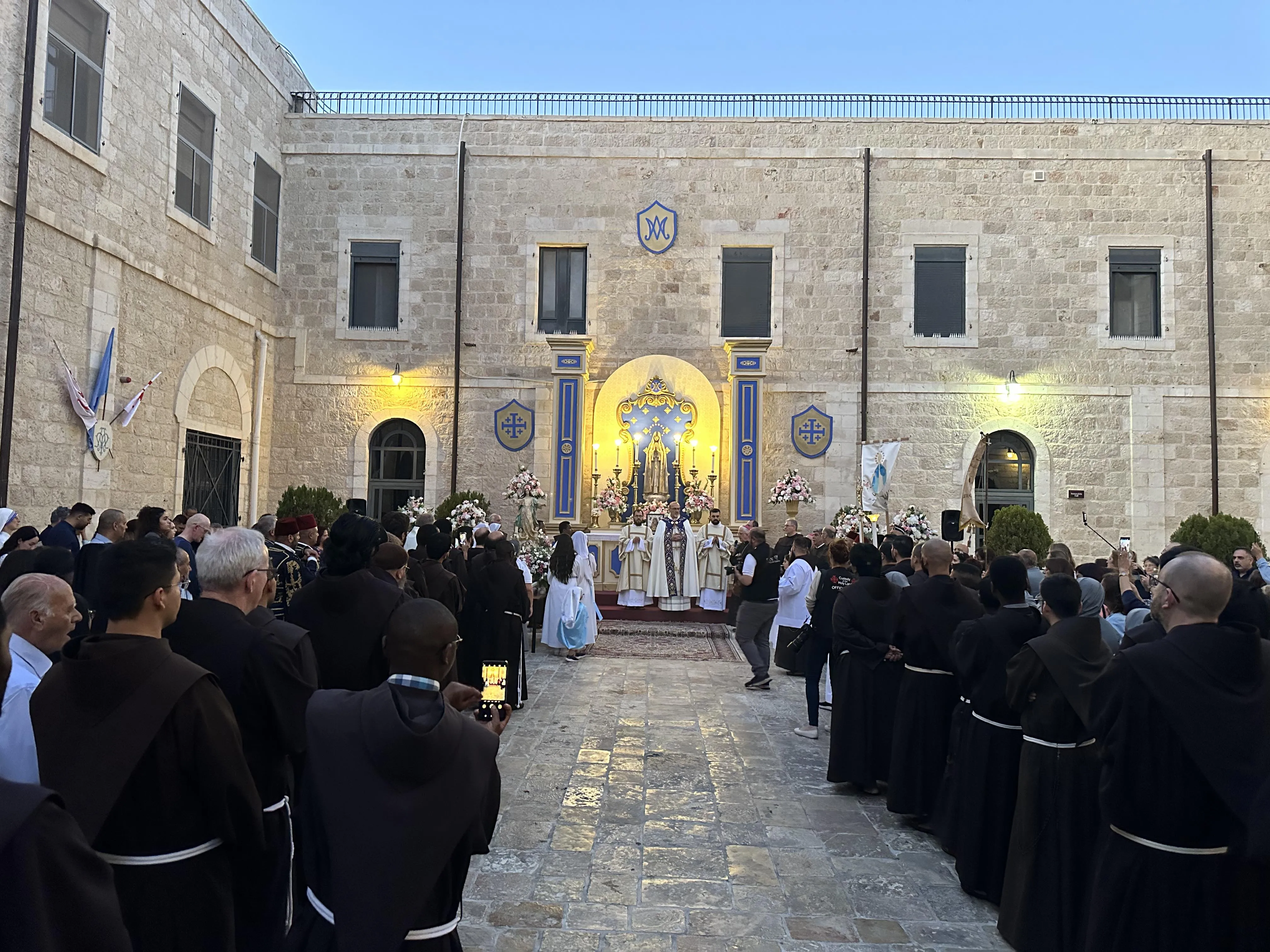 Pilgrims attend Mass ahead of a Marian procession on May 31, 2024, near the Church of the Holy Sepulcher in the Old City of Jerusalem to ask Our Lady of Palestine to intercede for peace in war-torn Gaza.?w=200&h=150