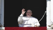 Pope Francis waves at pilgrims and visitors gathered for the Angelus on Dec. 29, 2024, in St. Peter’s Square at the Vatican.