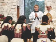 Archbishop Gustavo García-Siller of San Antonio blesses matachine dancers during a celebration on the feast of Our Lady of Guadalupe. He believes that Hispanics — immigrants especially — will help bring new life into the Church.