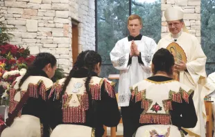 Archbishop Gustavo García-Siller of San Antonio blesses matachine dancers during a celebration on the feast of Our Lady of Guadalupe. He believes that Hispanics — immigrants especially — will help bring new life into the Church. Credit: Archdiocese of San Antonio