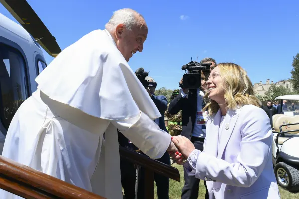 Pope Francis is greeted by Italy's Prime Minister Giorgia Meloni as he arrives at the Borgo Egnazia resort in Italy's Puglia region on June 14, 2024, to participate for the first time in a G7 Summit. In his remarks, the pontiff stressed that human dignity requires that the decisions of artificial intelligence (AI) be under the control of human beings. Credit: Vatican Media