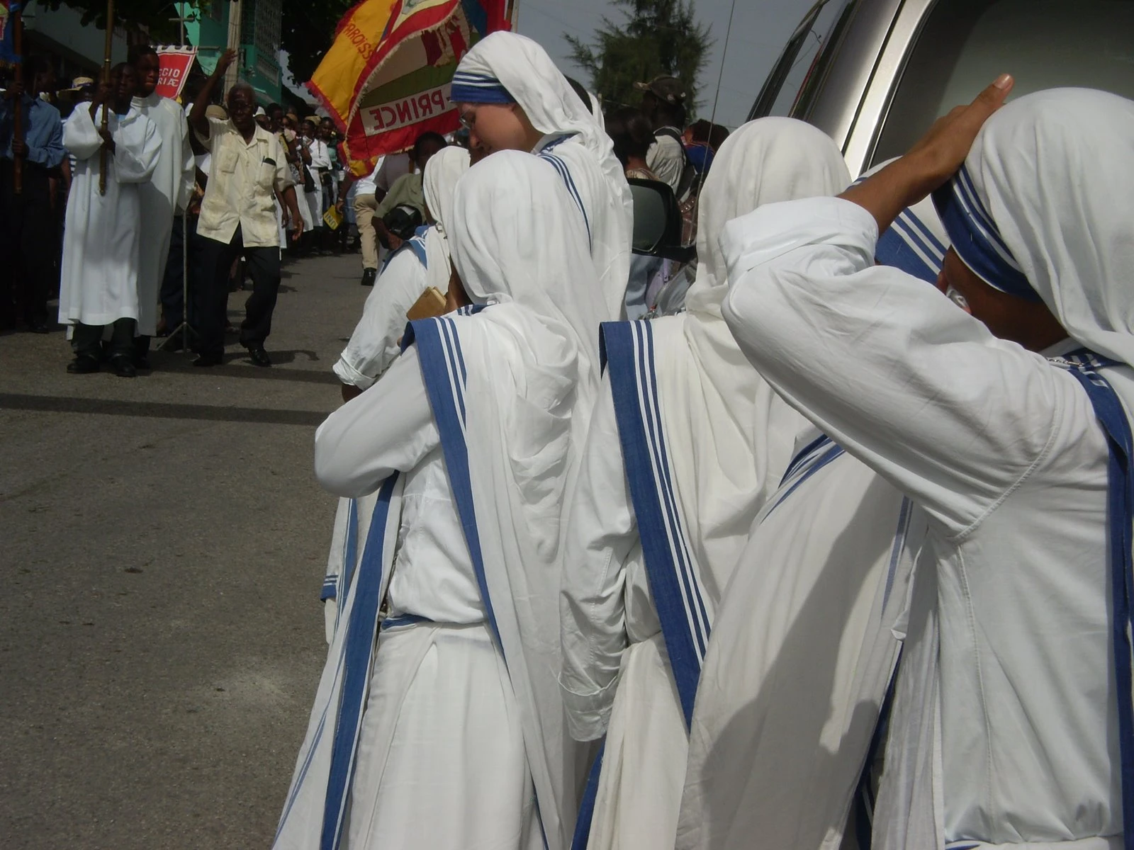 Missionaries of Charity during a religious procession in the streets of Port-au-Prince, Haiti.?w=200&h=150