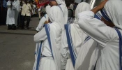 Missionaries of Charity during a religious procession in the streets of Port-au-Prince, Haiti.