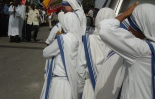 Missionaries of Charity during a religious procession in the streets of Port-au-Prince, Haiti. Credit: Willuconquer, Wikimedia