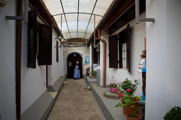 A sister walks through the Missionaries of Charity mission where Mother Teresa used to stay in Rome. Credit: Courtney Mares/CNA