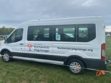 Small white vans dubbed "monstrance mobiles" are being used for the National Eucharistic Pilgrimage. They are just big enough for some of the "perpetual pilgrims" and a pedestal upon which Christ in the monstrance can be placed.
