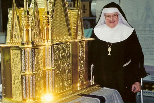 Mother Angelica poses for a picture with the tabernable inside the Shrine of the Most Blessed Sacrament. Credit: Photo courtesy of Shrine of the Most Blessed Sacrament