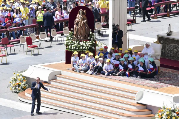 Italian actor Roberto Benigni speaks at the World Children's Day in St. Peter's Square at the Vatican on May 26, 2024. He took the stage for a lively and inspirational monologue that combined good humor with a call for children to read and to dream. Credit: Daniel Ibañez/CNA