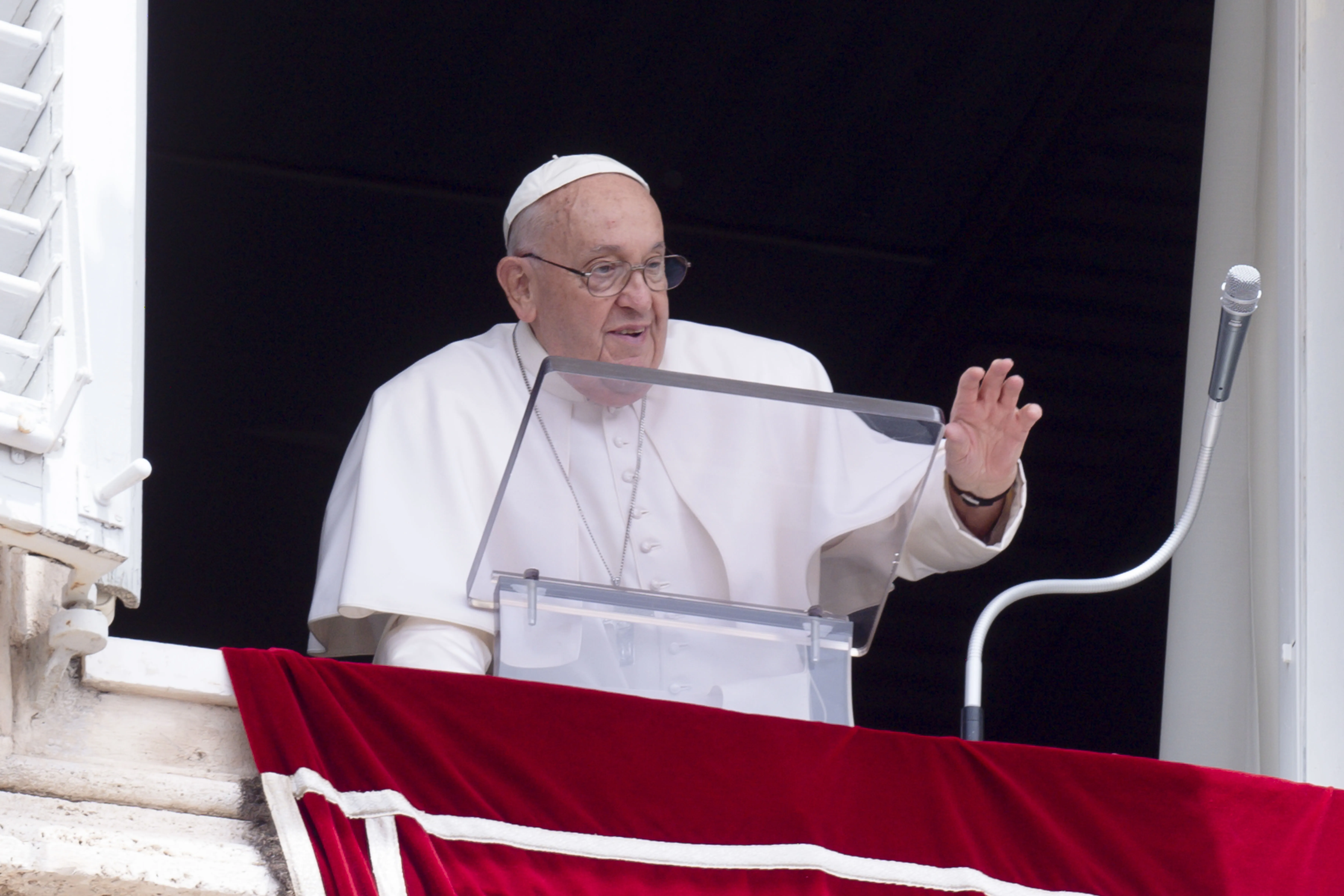 Pope Francis waves to the crowd gathered in St. Peter's Square to hear his Angelus address on Sunday, June 9, 2024.?w=200&h=150