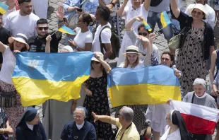 At his Angelus address June 9, 2024, Pope Francis  asked people to pray for the people who are suffering in Myanmar and in Ukraine, giving a special shoutout to some Ukrainians who were in the crowd waving flags. Credit: Vatican Media